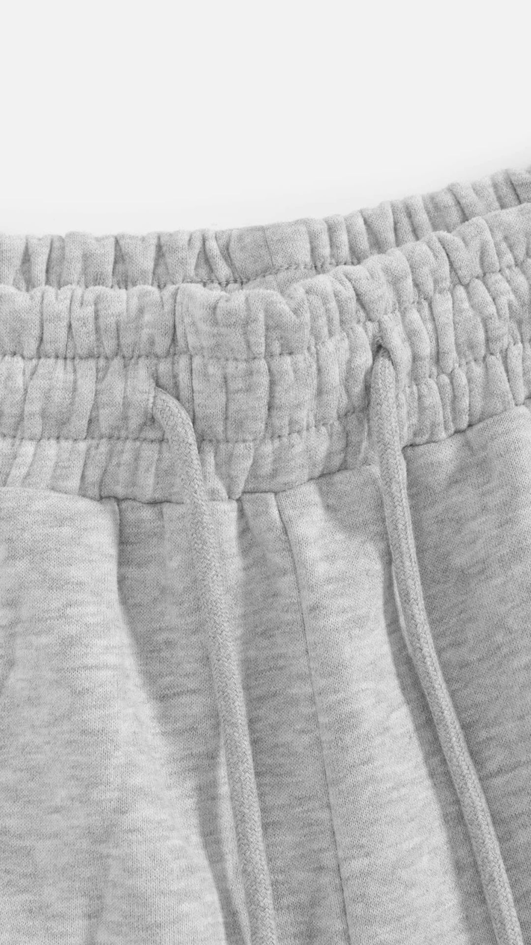 Jogginghose mit verspielten Pfotenstickereien