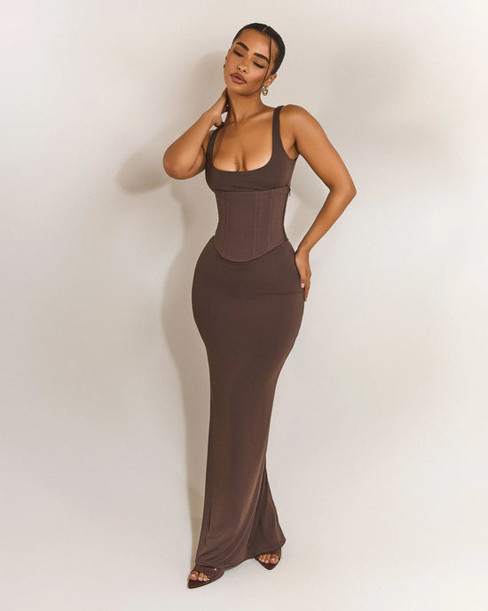 Das mühelose formende Kleid
