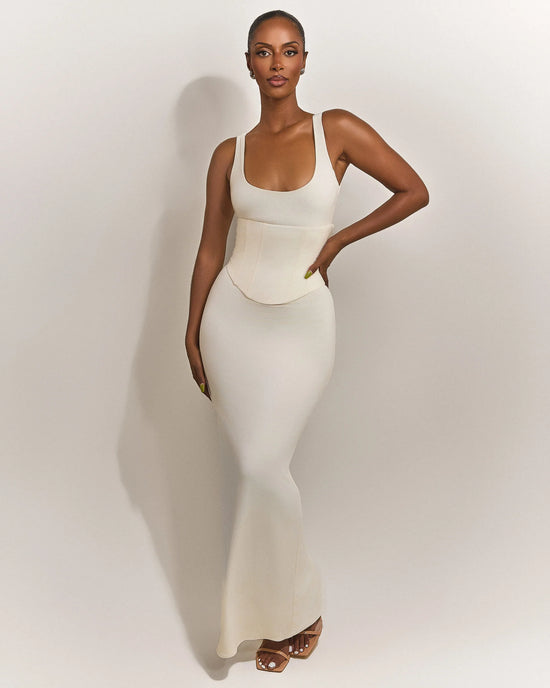 Das mühelose formende Kleid